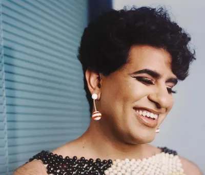 Alok writes and jokes about gender, and they're coming to Anchorage. First, they took our questions.